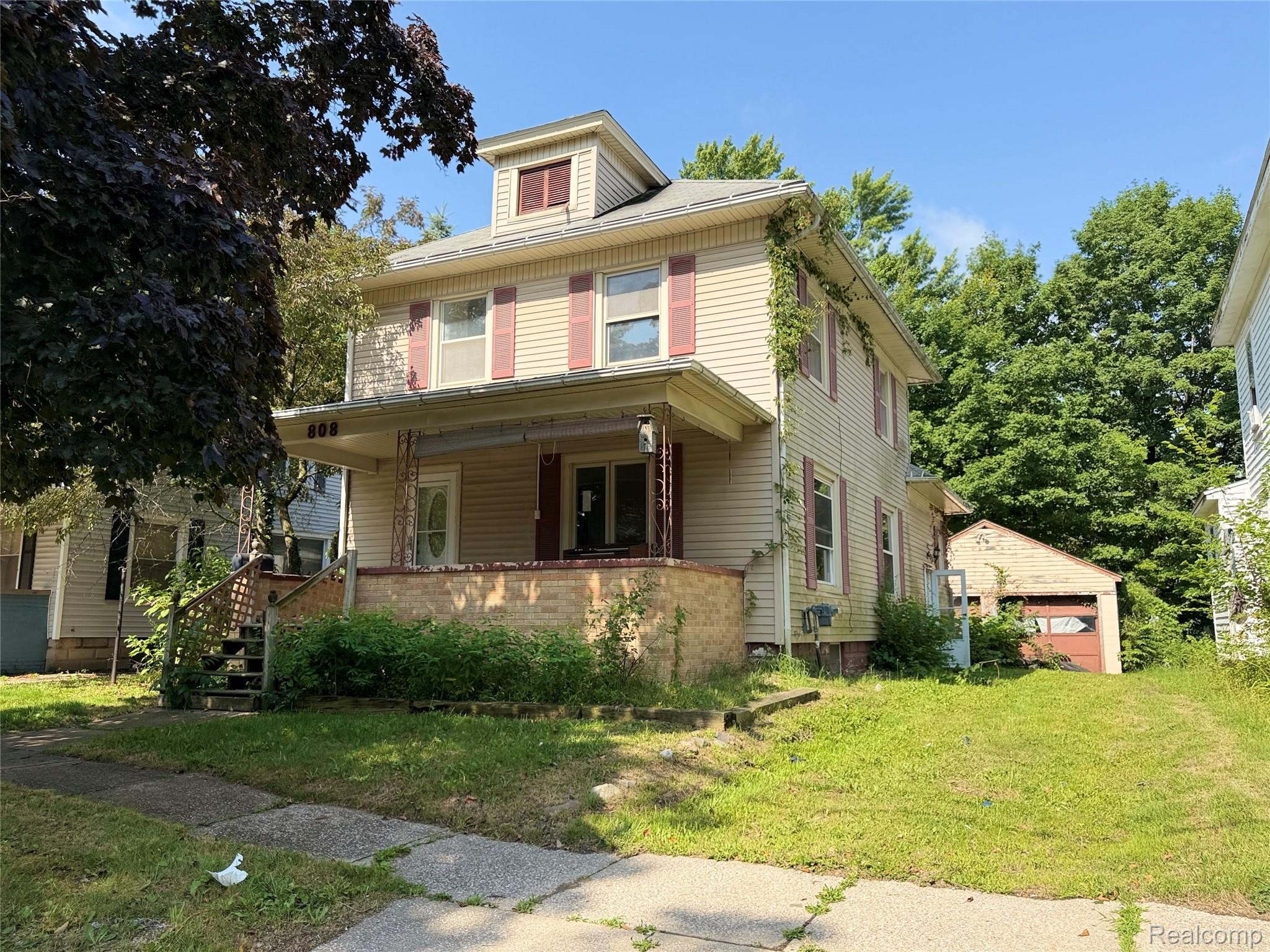 808, Division, Owosso, Michigan, 48867